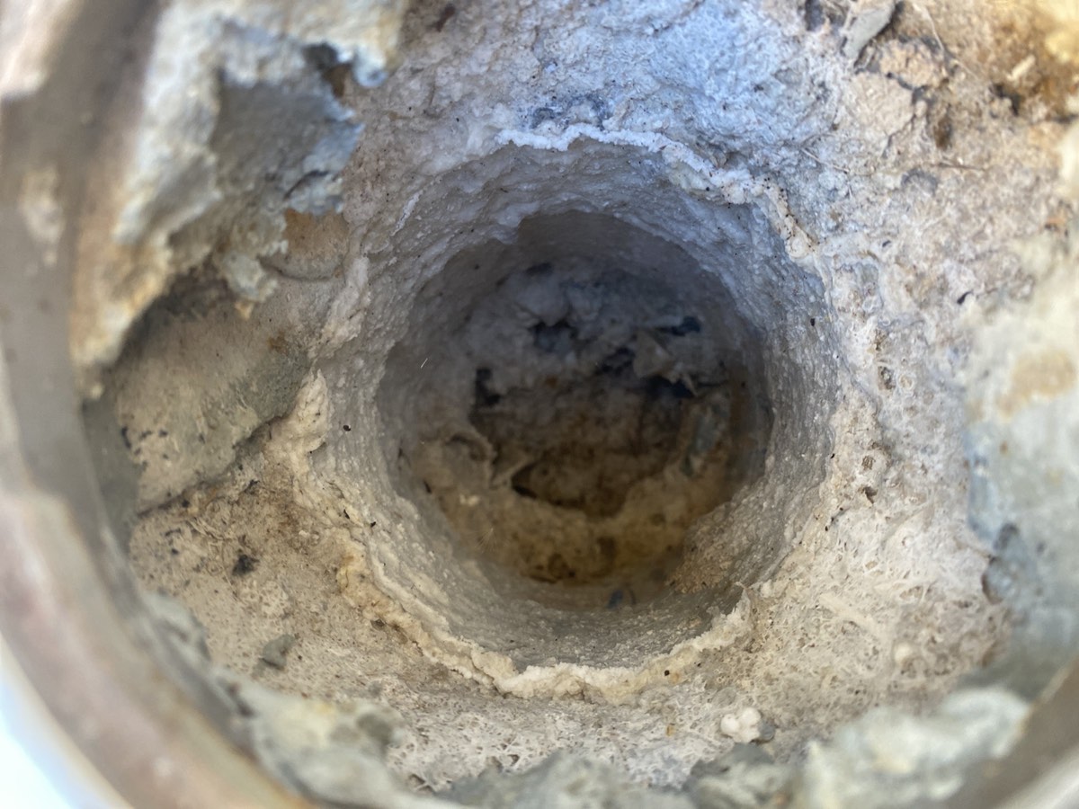 Blocked stormwater drainage, recorded during a handover inspection in Box Hill
