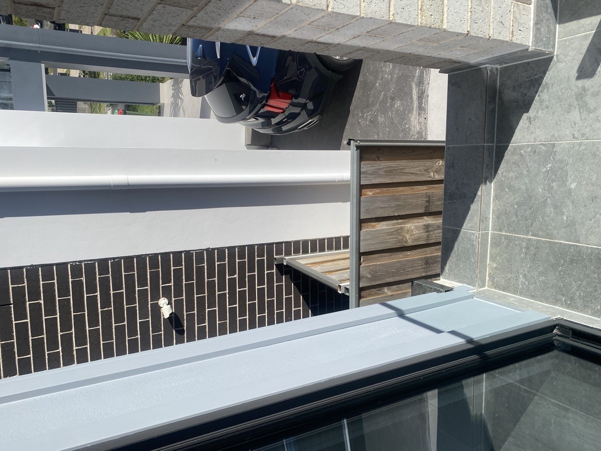 Balustrade not installed to a balcony, recorded on a handover inspection in Box Hill